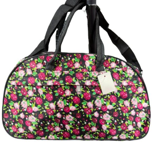 Maleta/Bolsa de viaje con diseño floral en tonos rosa y rojo.